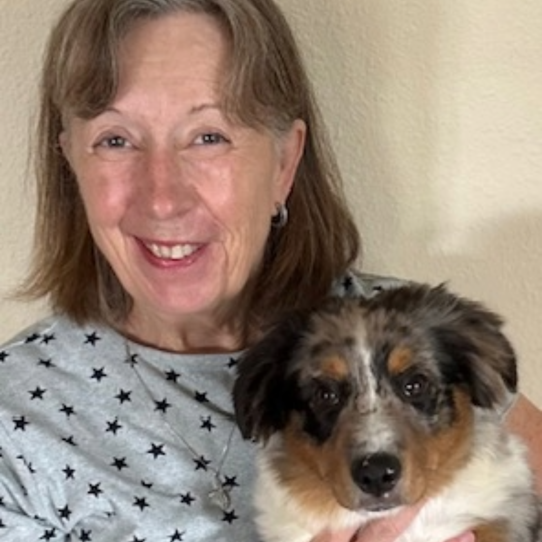Annie, from Vancouver, Washington poses with her new puppy in between Spanish classes.
