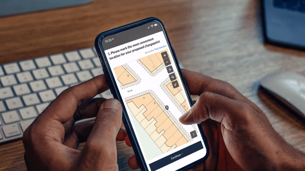 phone showing blocks on a geospatial map