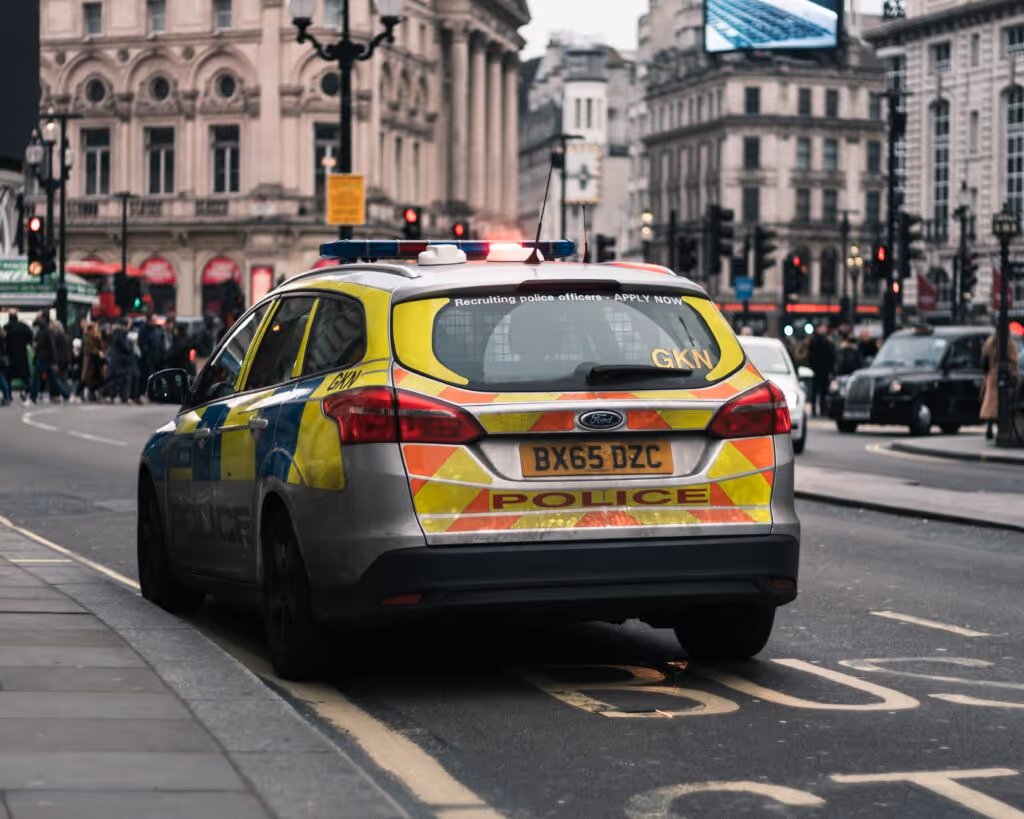 police car on busy street