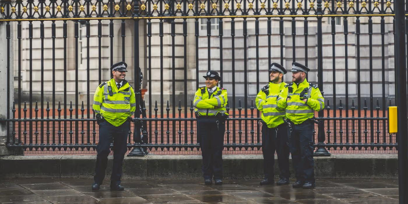 police positioned in front of a government building