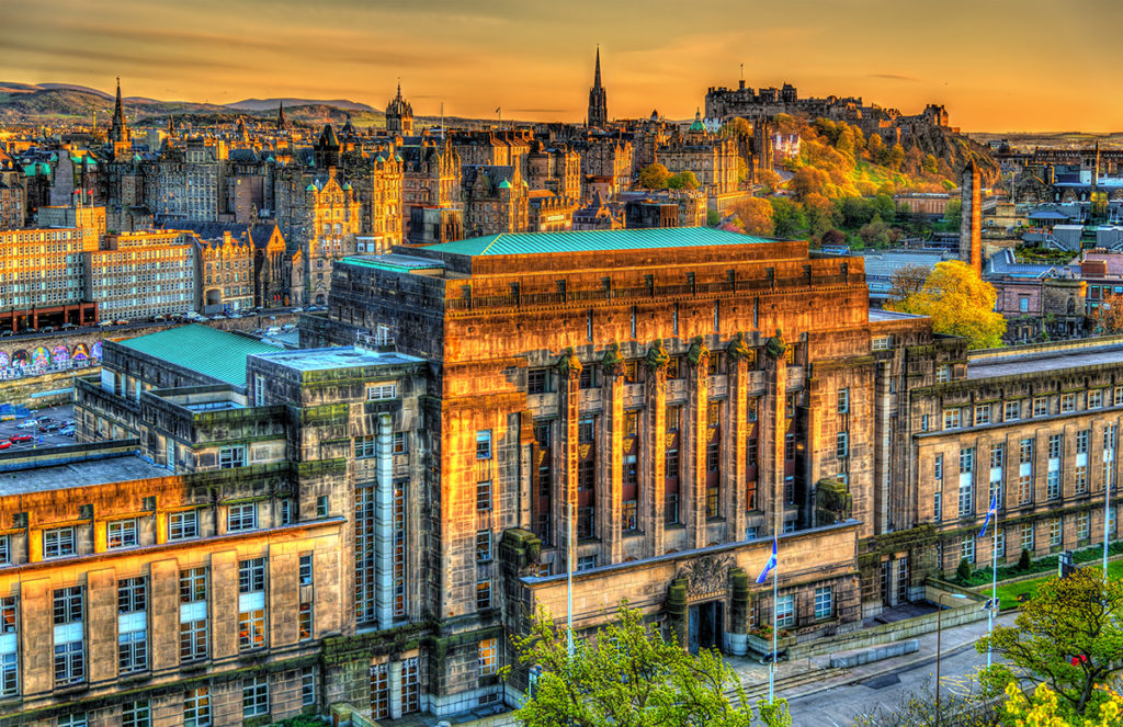 Scottish govt building with Edinburgh landscape 