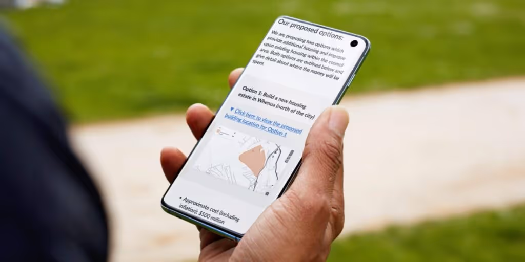 person looking at a phone that displays a statutory consultation on citizen space