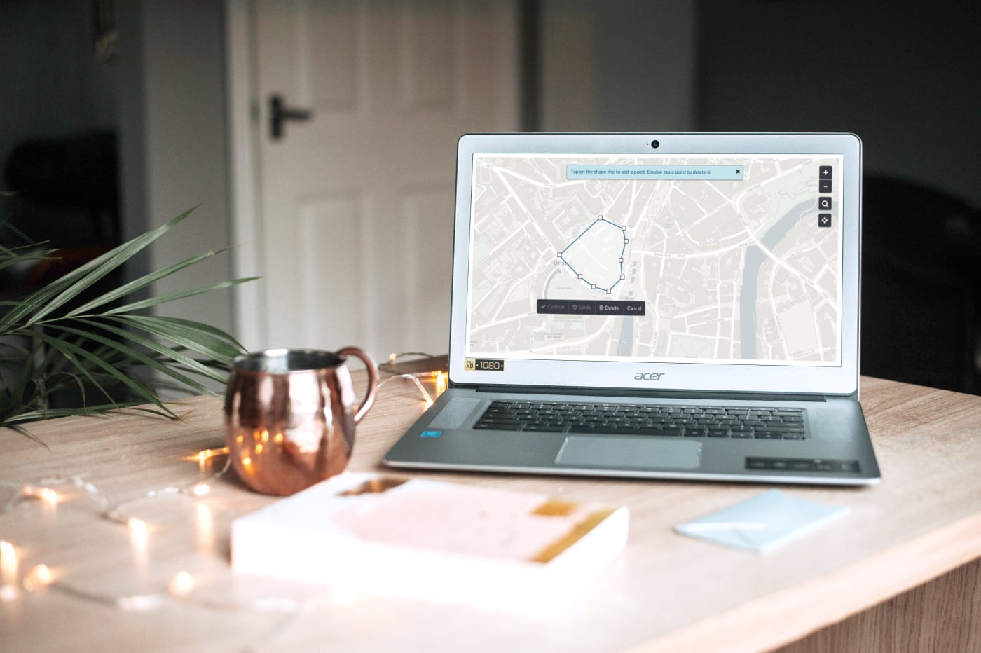 Laptop displaying a user's shape on Citizen Space Geospatial's 'draw a shape' activity type