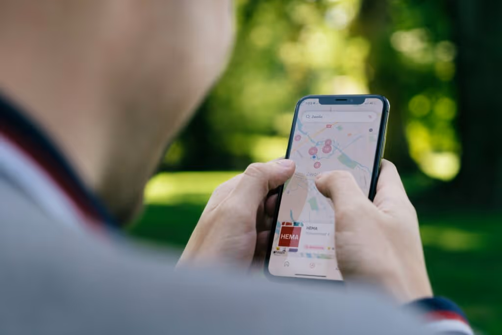 man looking at phone with Citizen Space on it