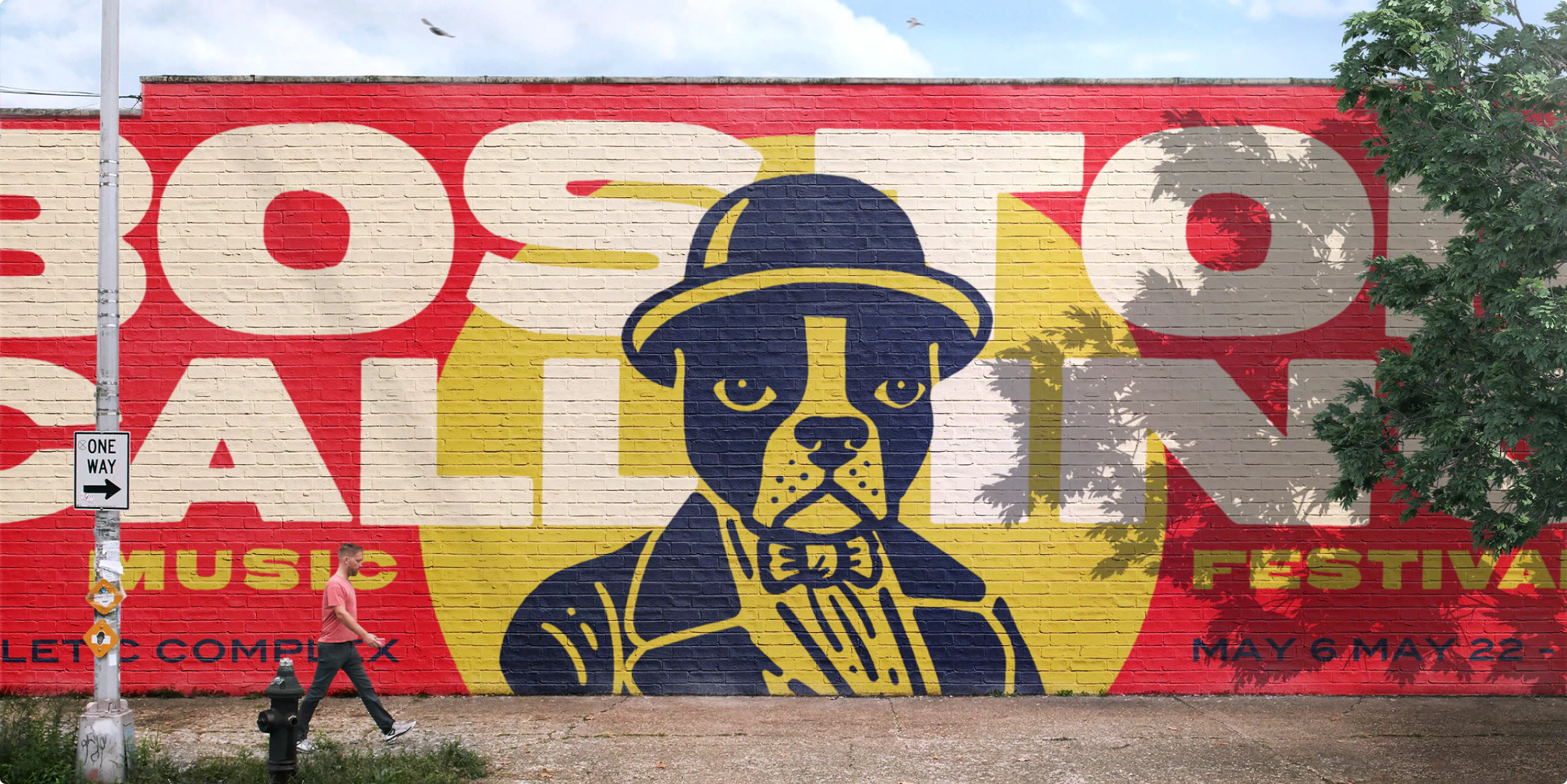 Large outdoor mural featuring the iconic Boston Calling dog logo. Designed by Colossus.