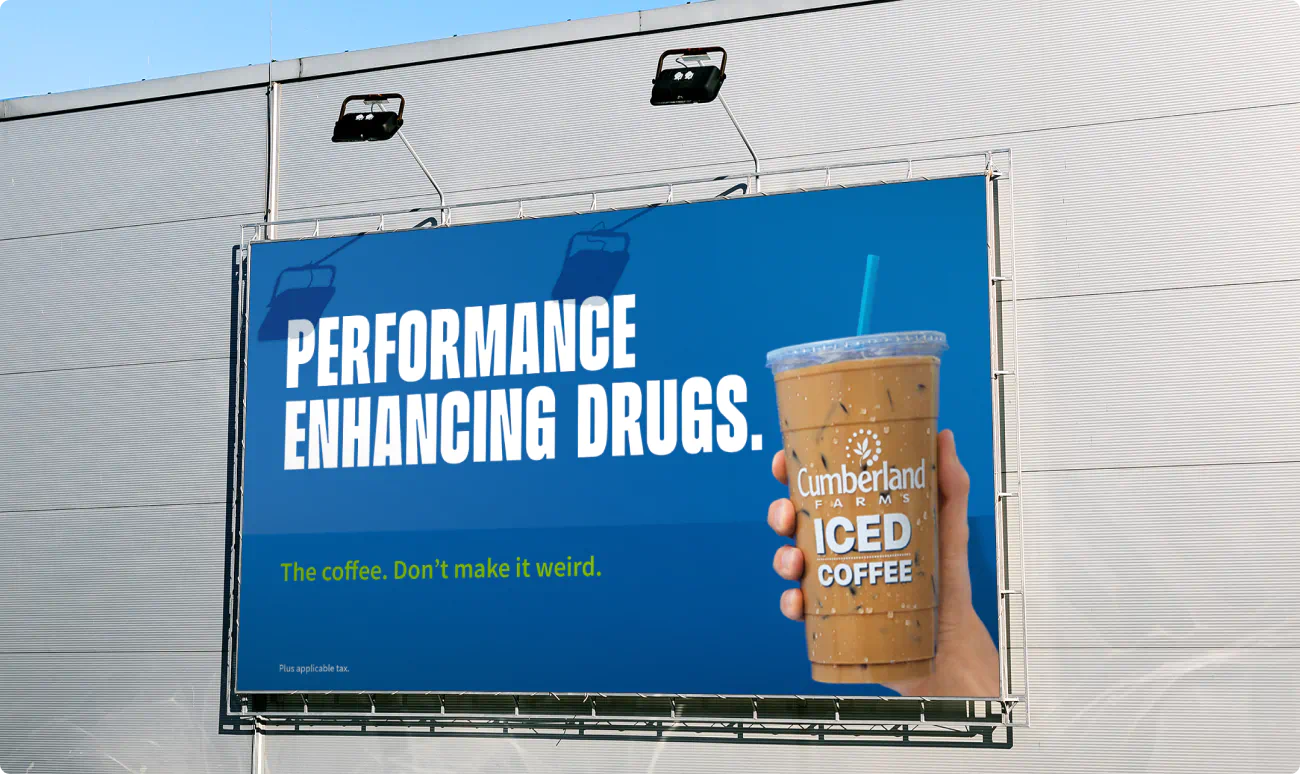 Cumberland Farms billboard. Blue background with one cup of ice coffee. The headline reads: "Performance enhancing drugs."