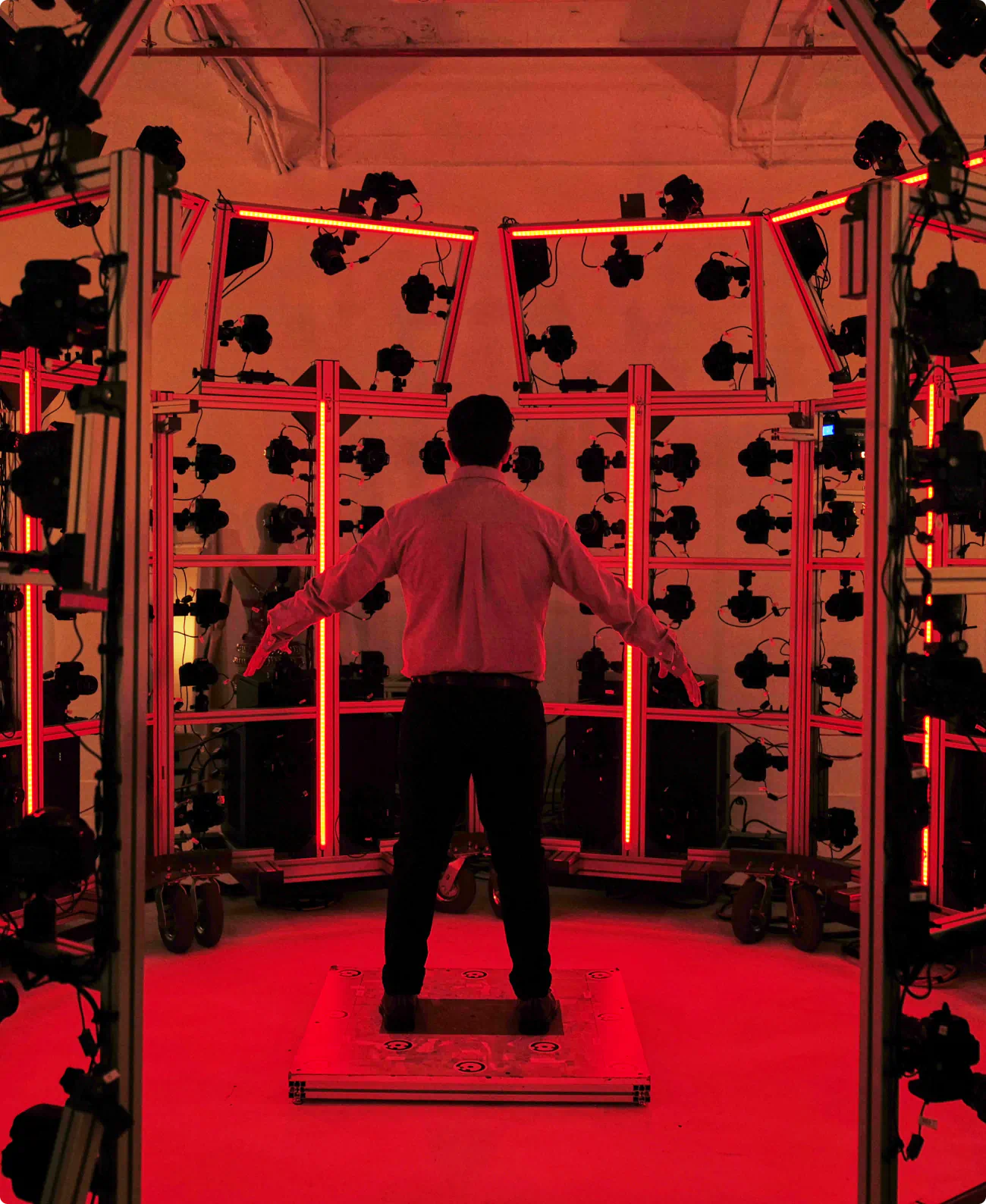 Image of the photography cage. Similar to the technique used in the intro to Apple TVs "Severance", we used 162 DSL cameras to capture body images of each model.