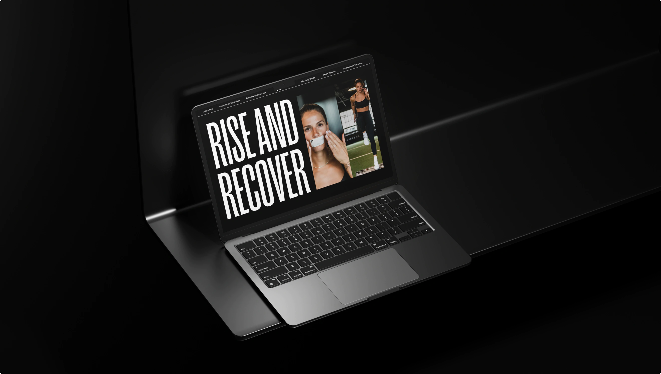 Homepage design for ecomm website for Dream Performance. It is a sleek design with large white type set against a black background. It reads: "Rise & Recover."