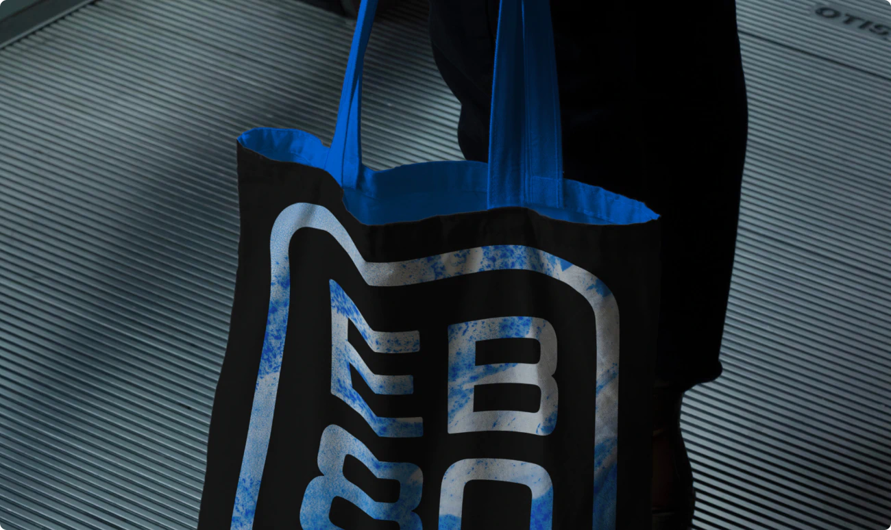 A tote bag designed with EB80 branding.