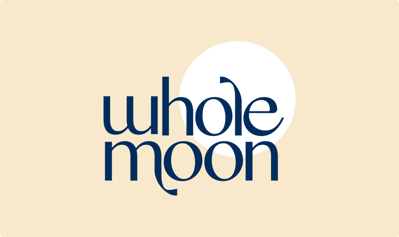 The Whole Moon logo.