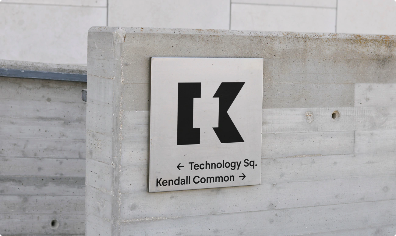 Kendall Square wayfinding black with new Kendall Square logo.