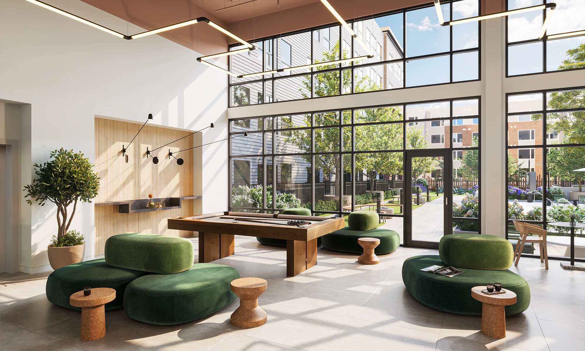 Beautifully designed lobby of the Jade complete with pool table and modern green furniture.