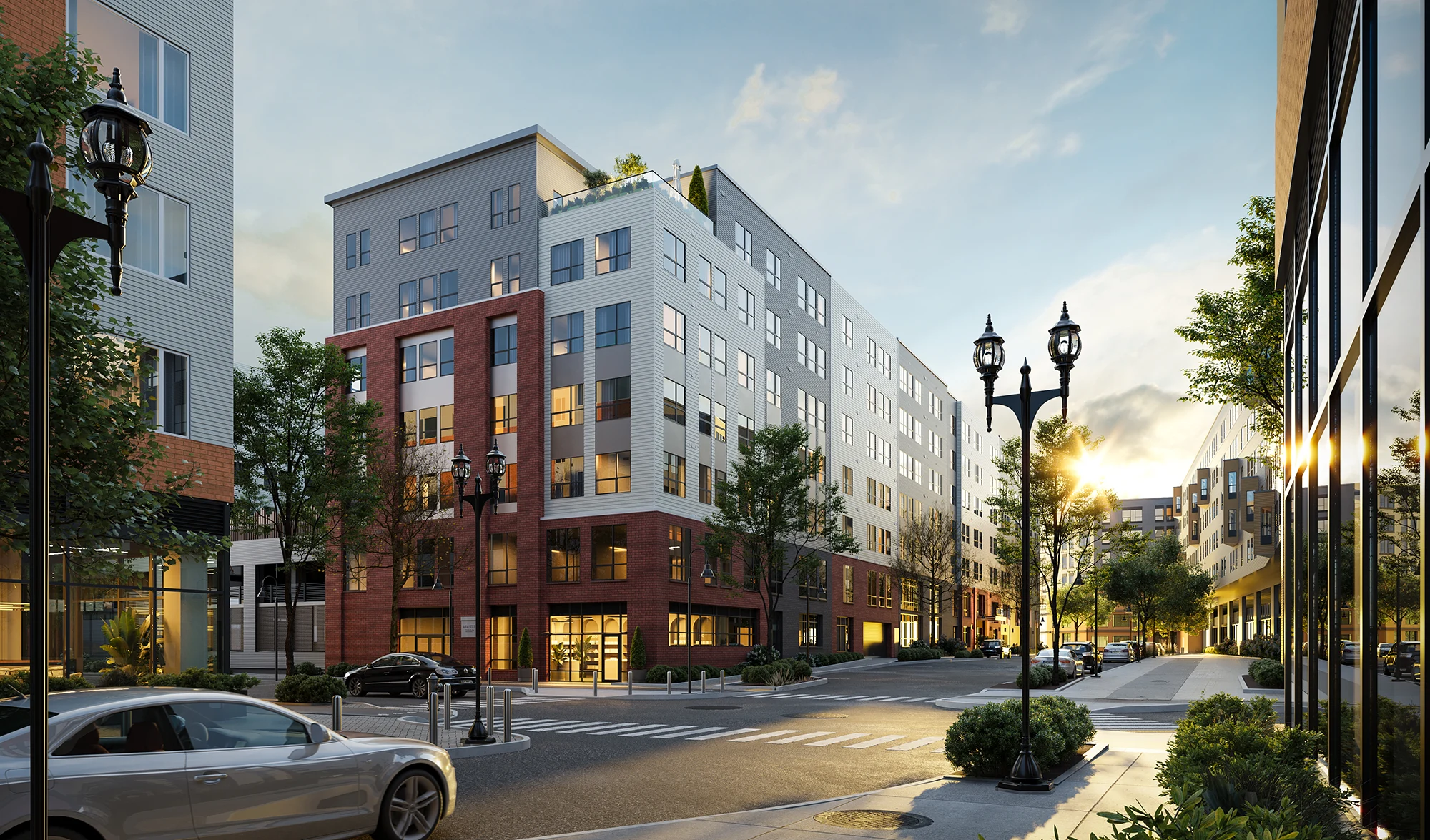 Exterior of the Jade apartment building at sunset.