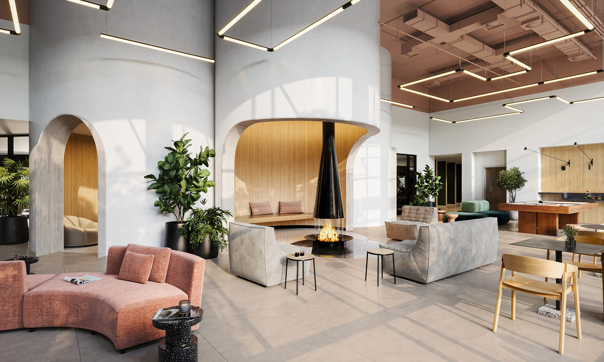 A white modern lobby with a fireplace in a new development building from Greystar.