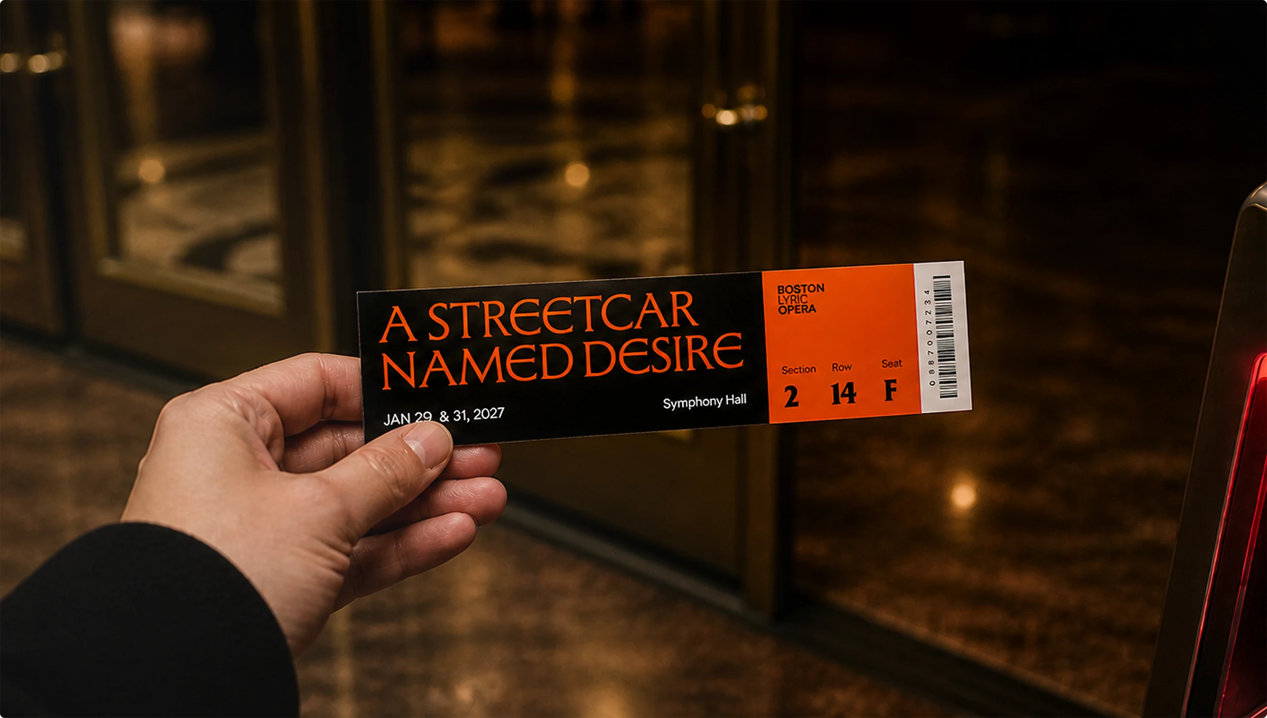 Hand holding up a ticket for "A Streetcar Named Desire" at BLO.