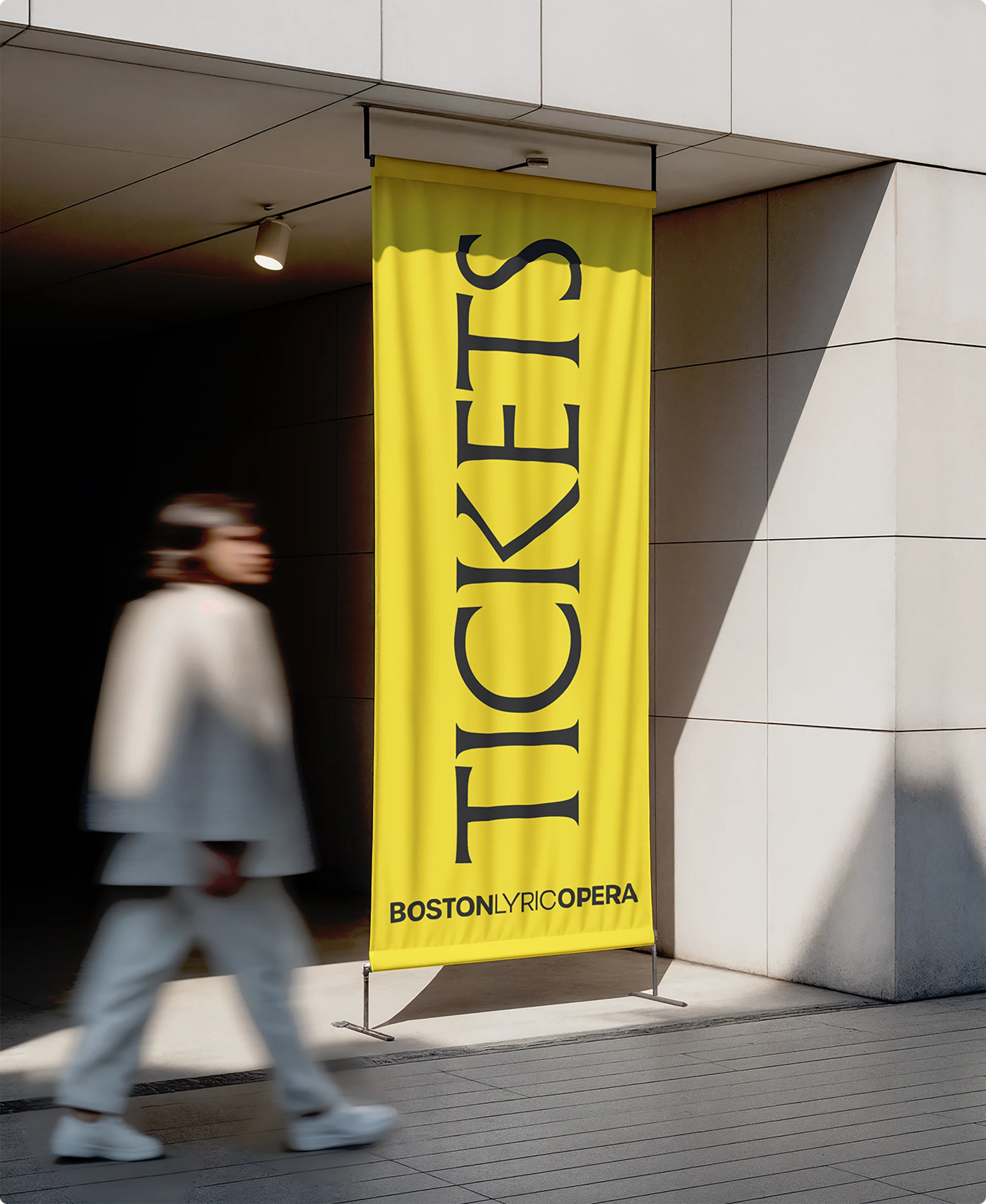 Yellow hanging banner for TICKET OFFICE at Boston Lyric Opera.