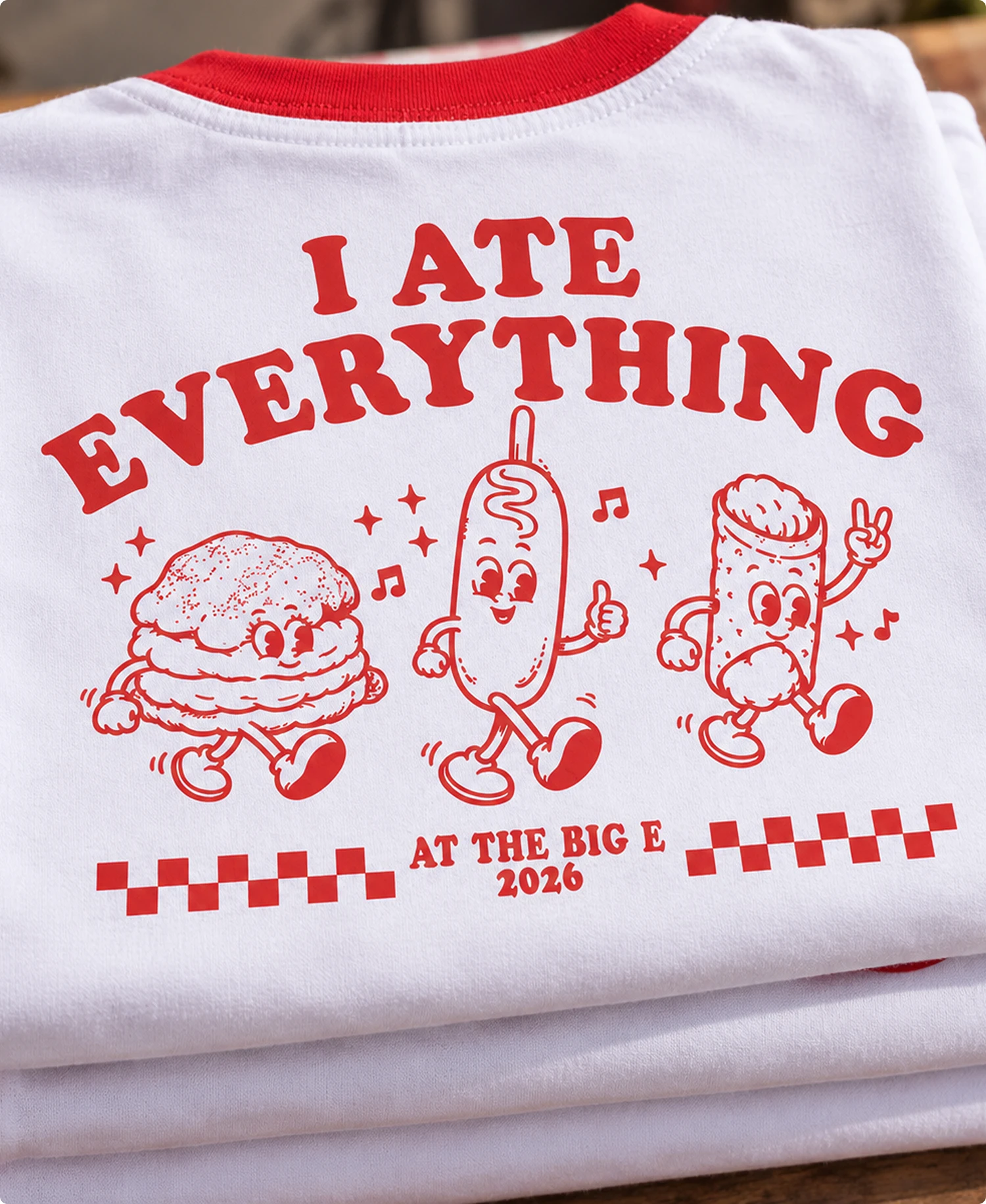 Big E merch design by Colossus. "I ATE EVERYTHING AT THE BIG E 2026."