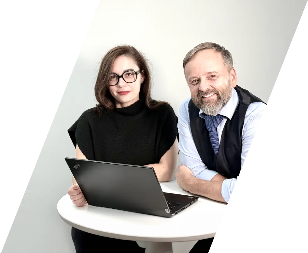 Team members standing behind the table