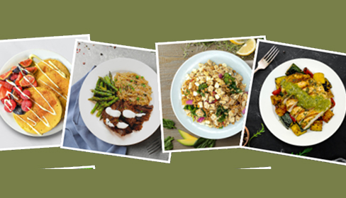 Four plates of different prepared meals including pancakes with strawberries, steak with green beans, a quinoa salad, and grilled chicken with vegetables.