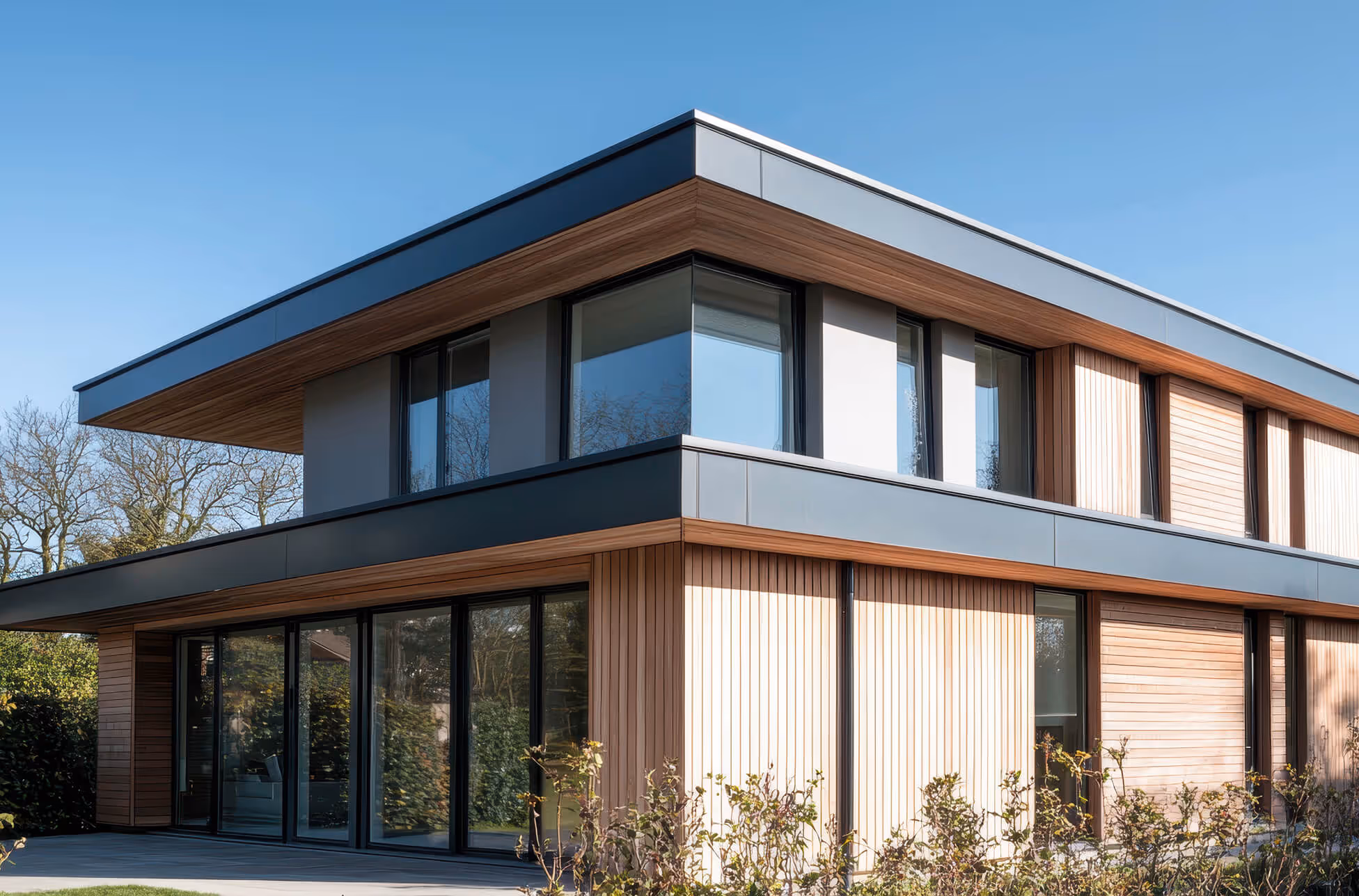 A modern house with a perfectly flat roof from Roof Tek.