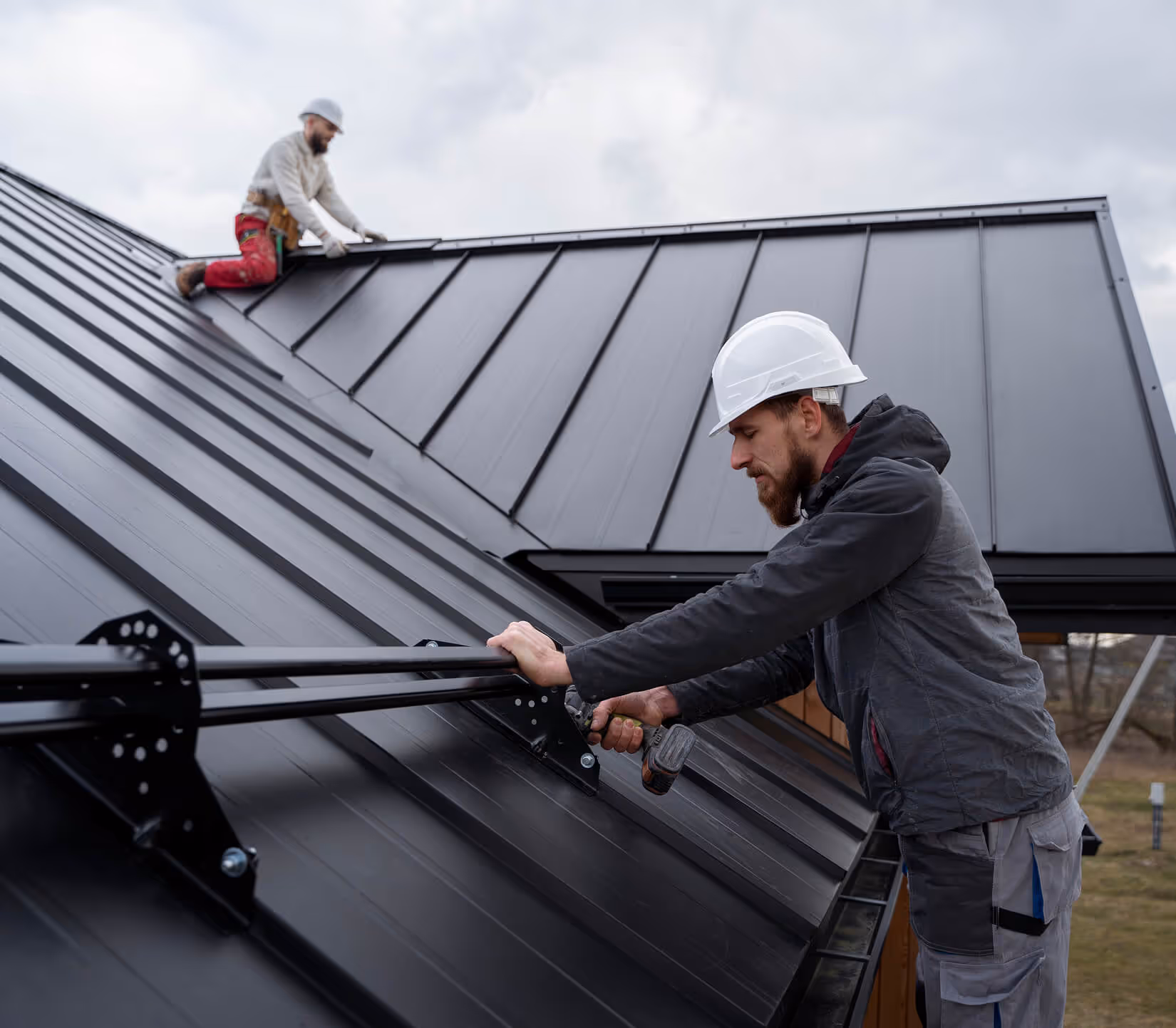 A specialist performs technical maintenance and inspects the roof's condition.