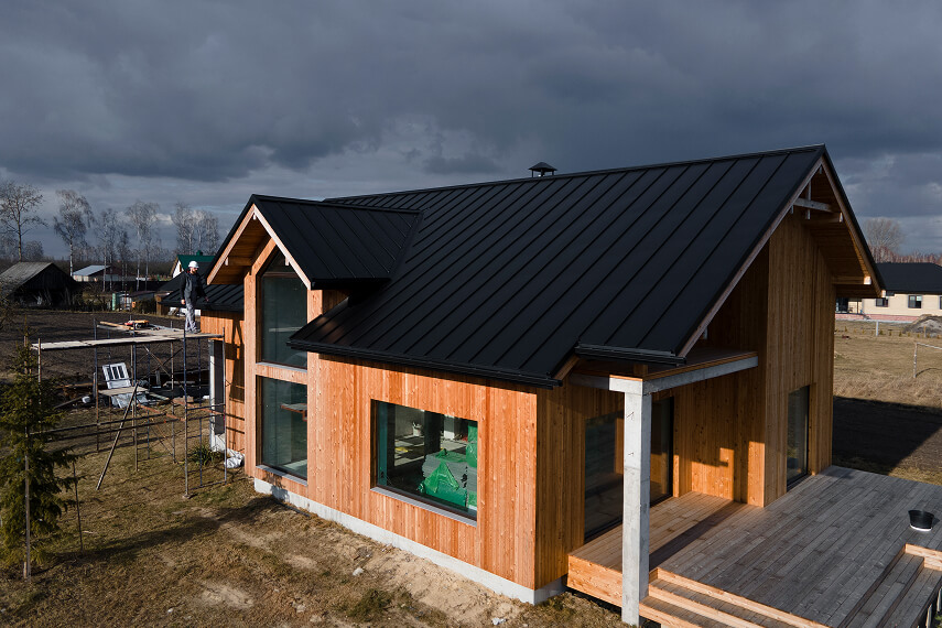 A specialist performs technical maintenance and inspects the roof's condition.