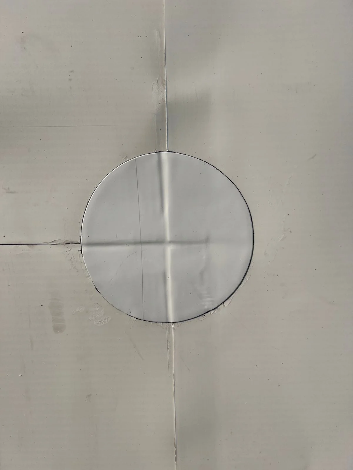 A specialist performs technical maintenance and inspects the roof's condition.