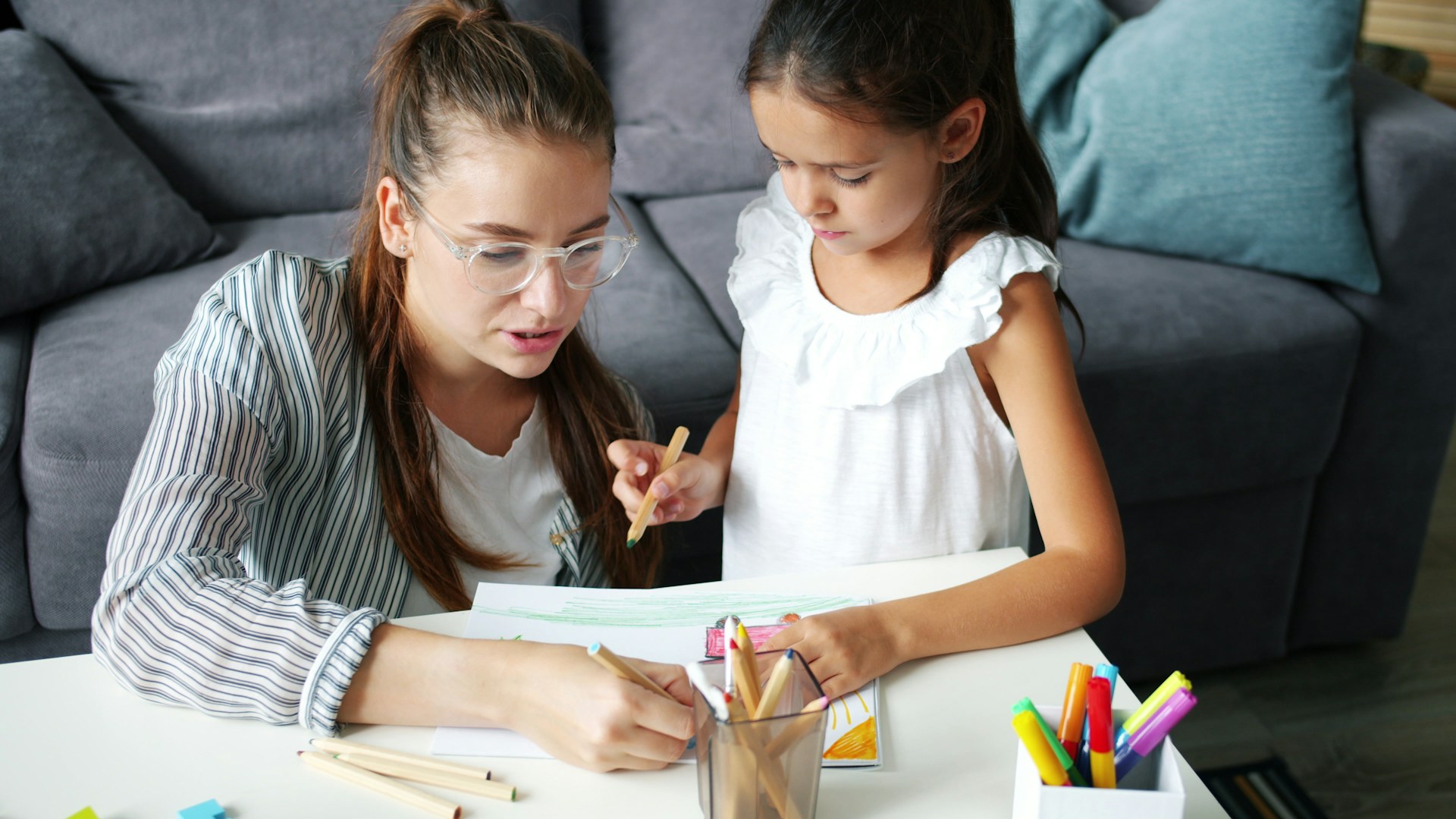 woman reading to child