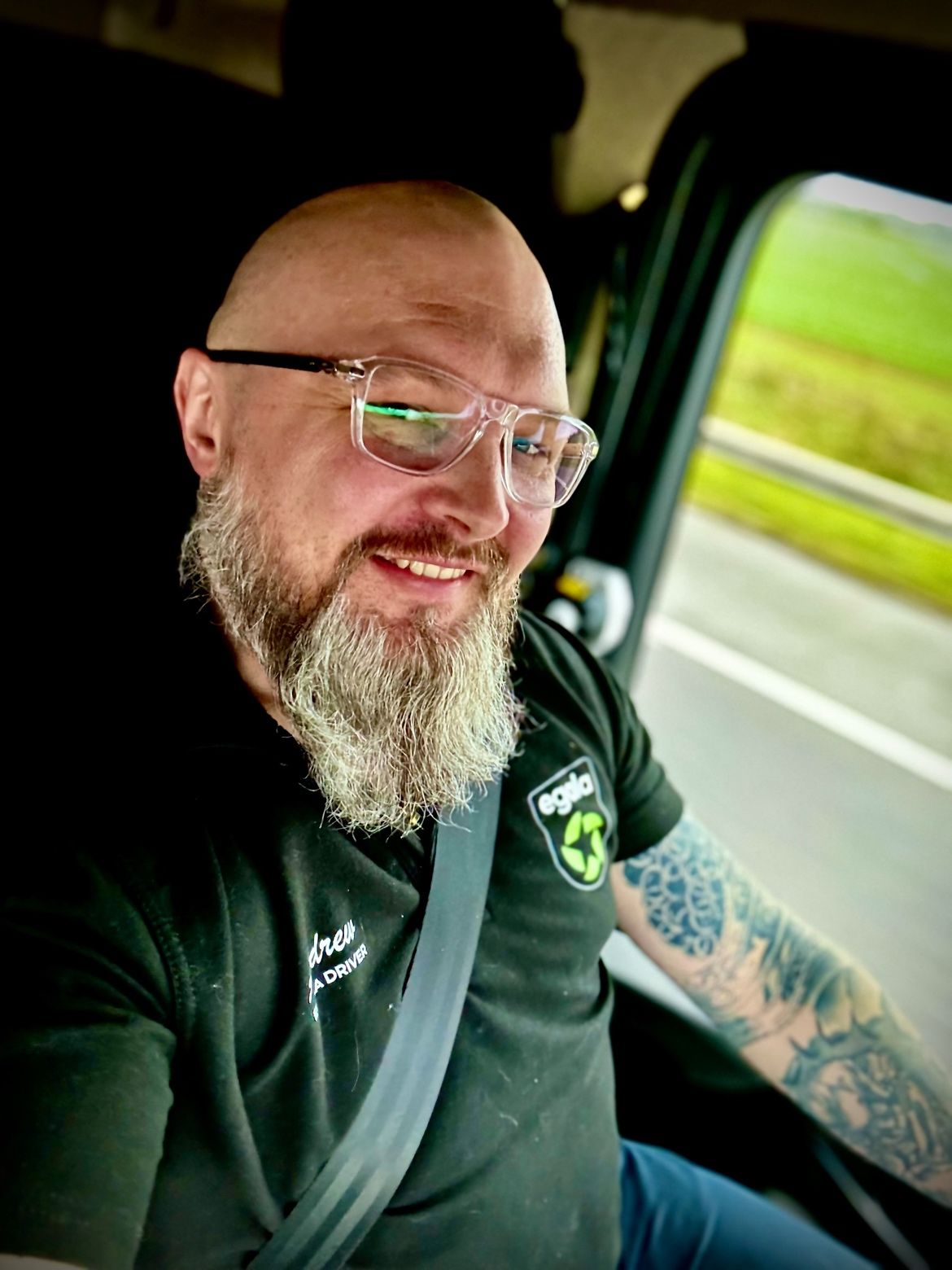 Egala by Boekestijn driver smiling while seated behind the wheel.