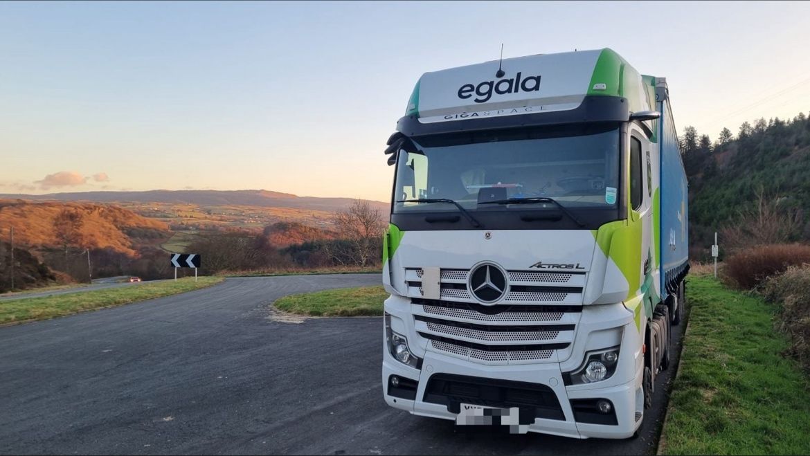 Egala by Boekestijn truck driving through scenic mountain route, symbolizing sustainable transport across challenging European terrains