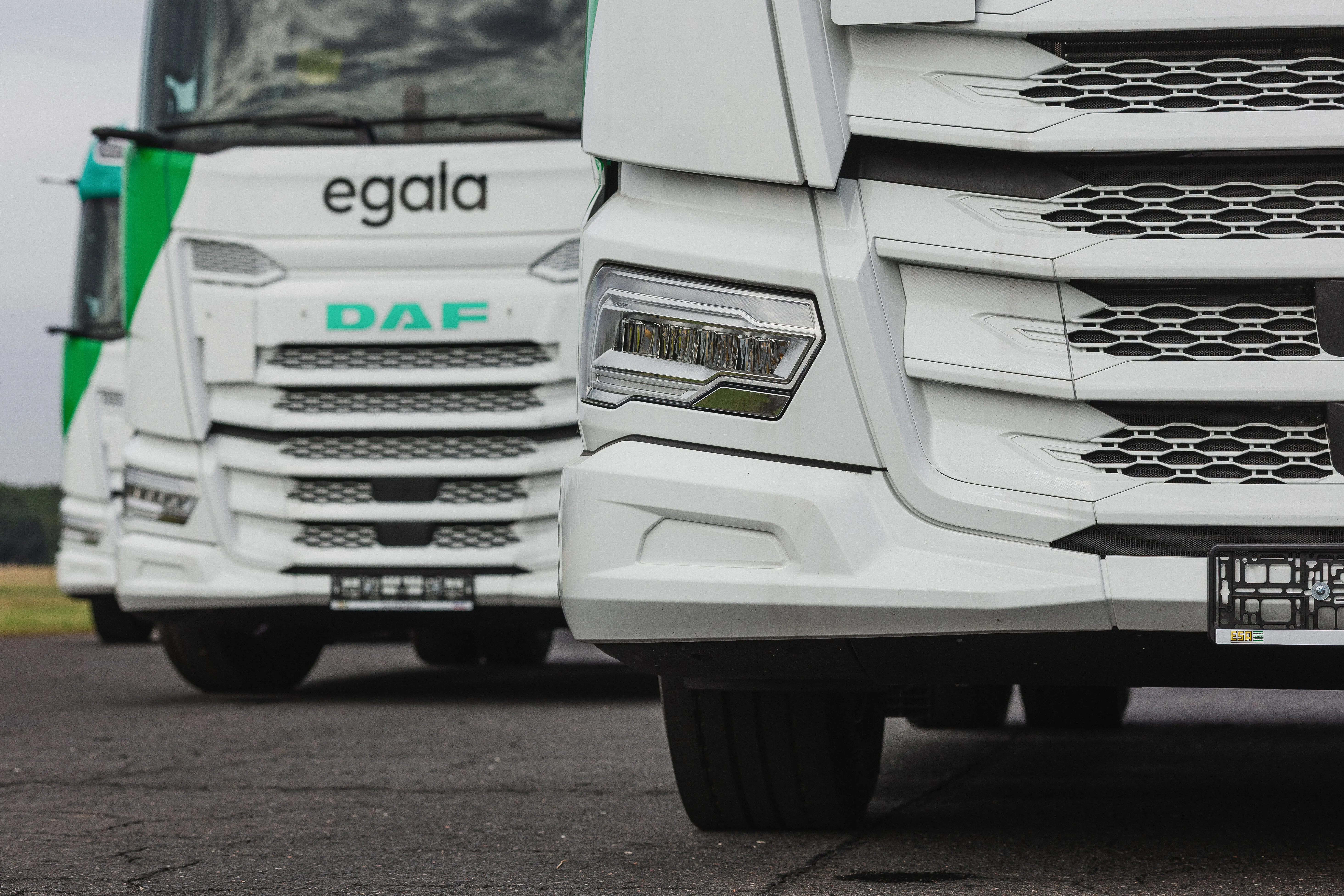 Close-up view of Egala by Boekestijn truck fronts parked side by side.