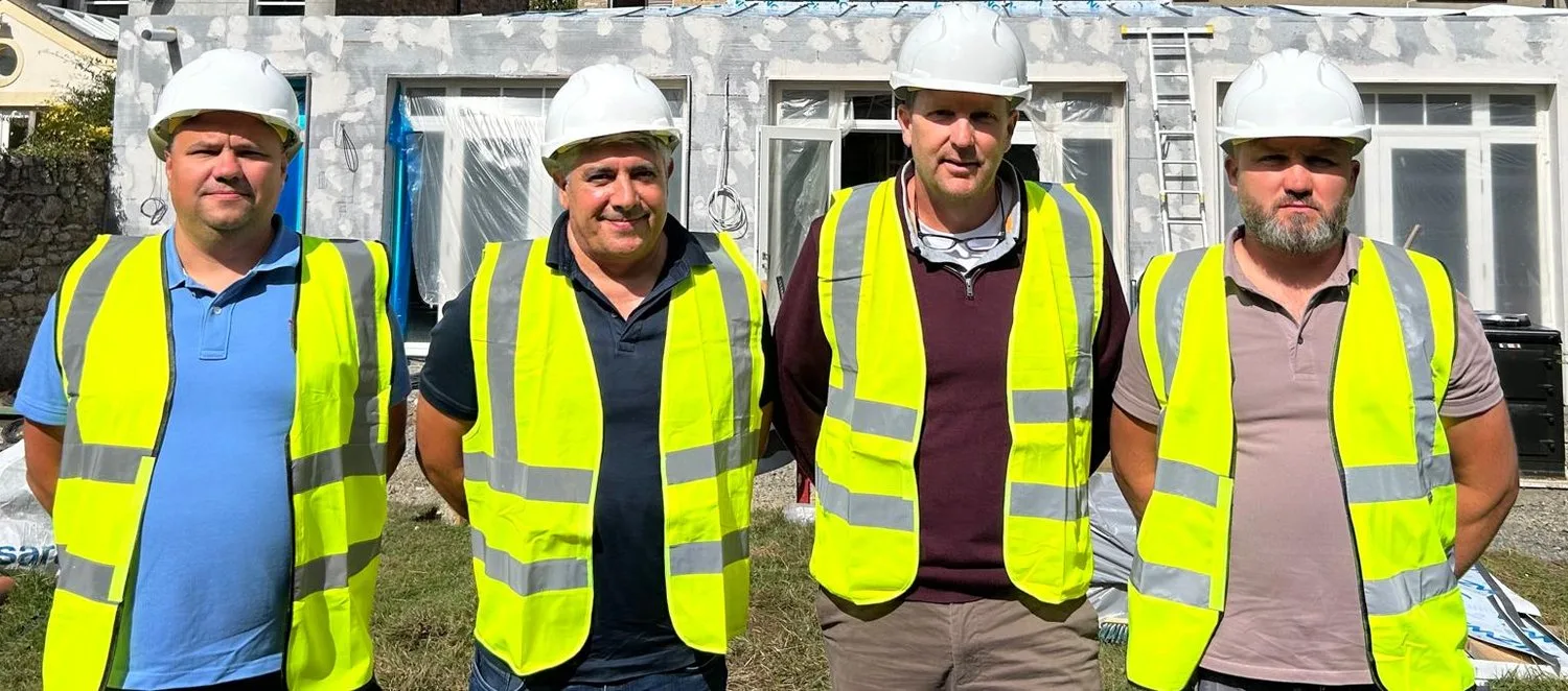 The four Concept Modular directors on site in hard hats and hi-vis
