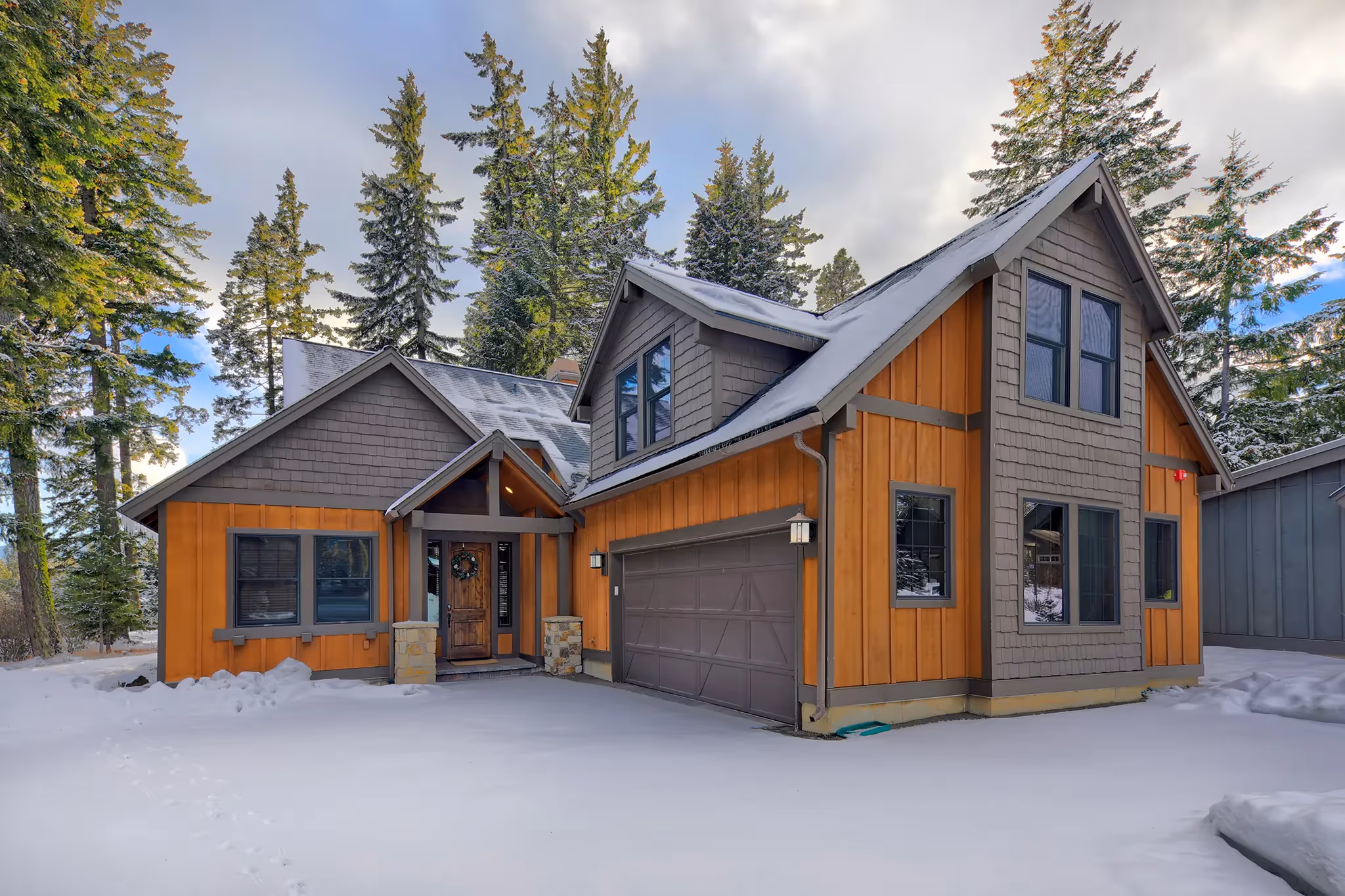 Luxury cottage in winter scene with snow