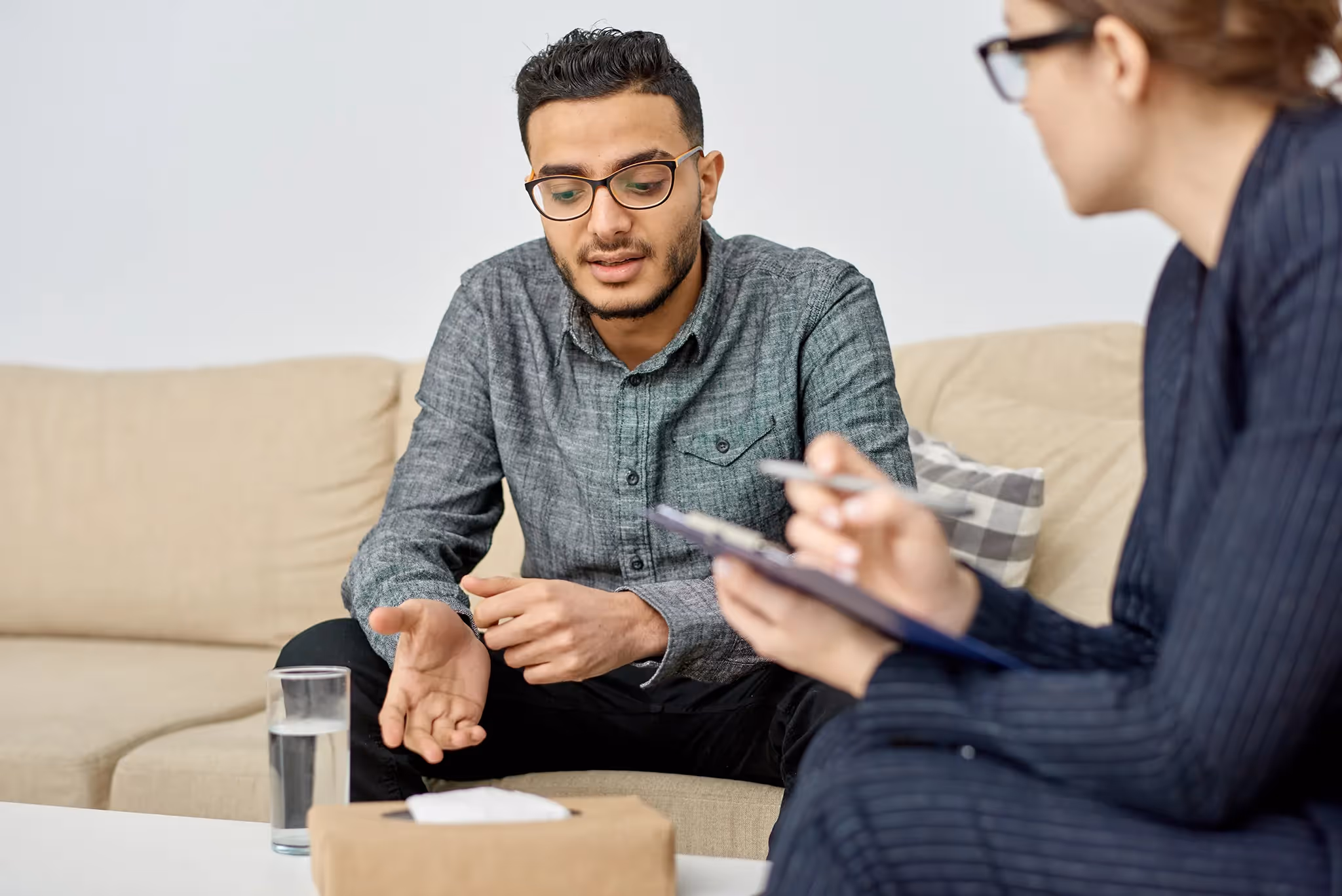 Young man talking to a PIB Trusted Advisor about his insurance needs
