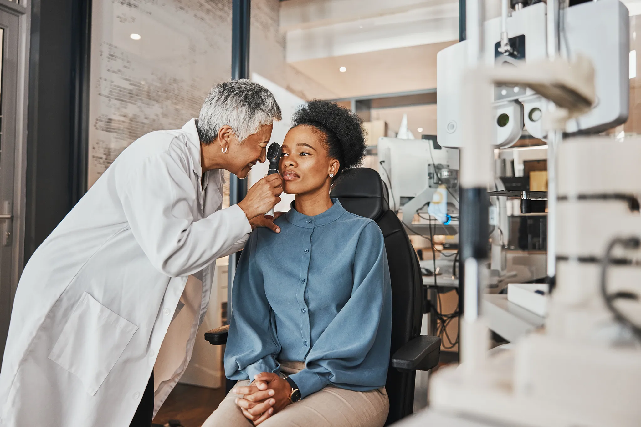 Young woman at the optometrist's office getting her eyesight checked