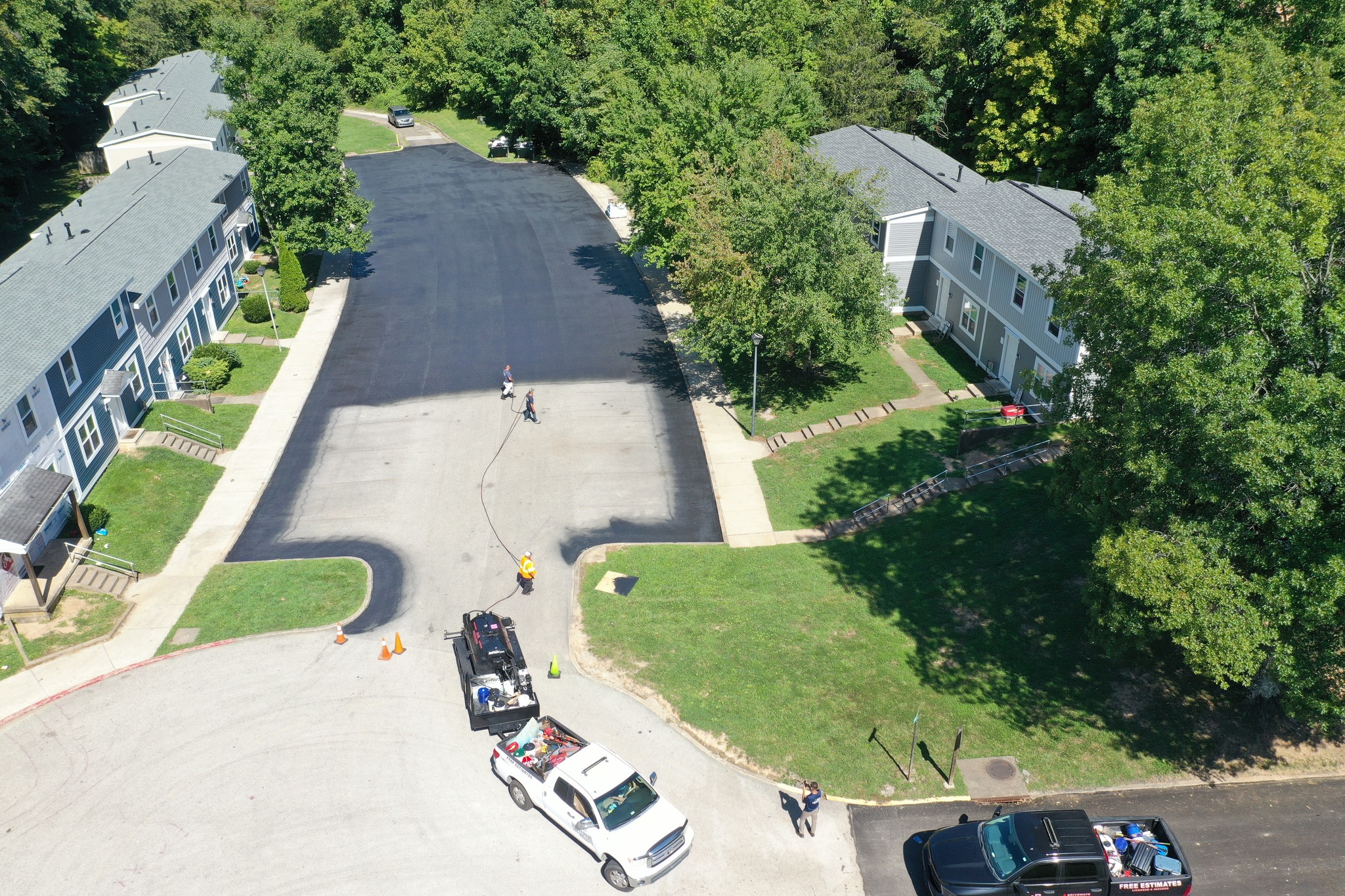 A newly paved parking lot at an apartment complex.