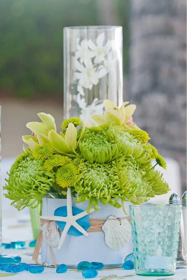 Seashell-themed floral centerpiece designed by Paradym Events for a coastal-inspired celebration