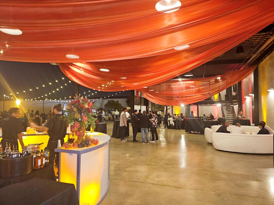 Disco ball reflecting colorful lights at a vibrant Portland event by Paradym Events