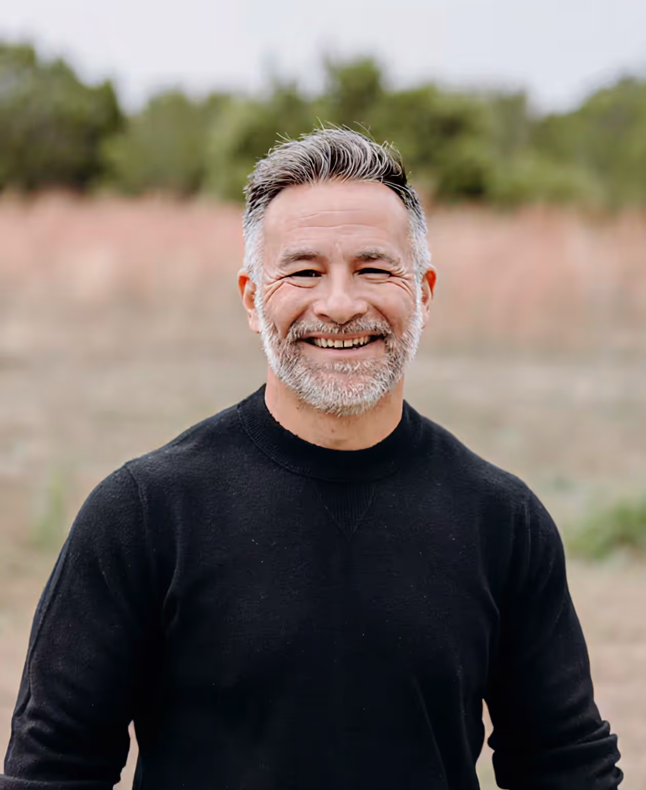 Portrait of Dustin Sample smiling