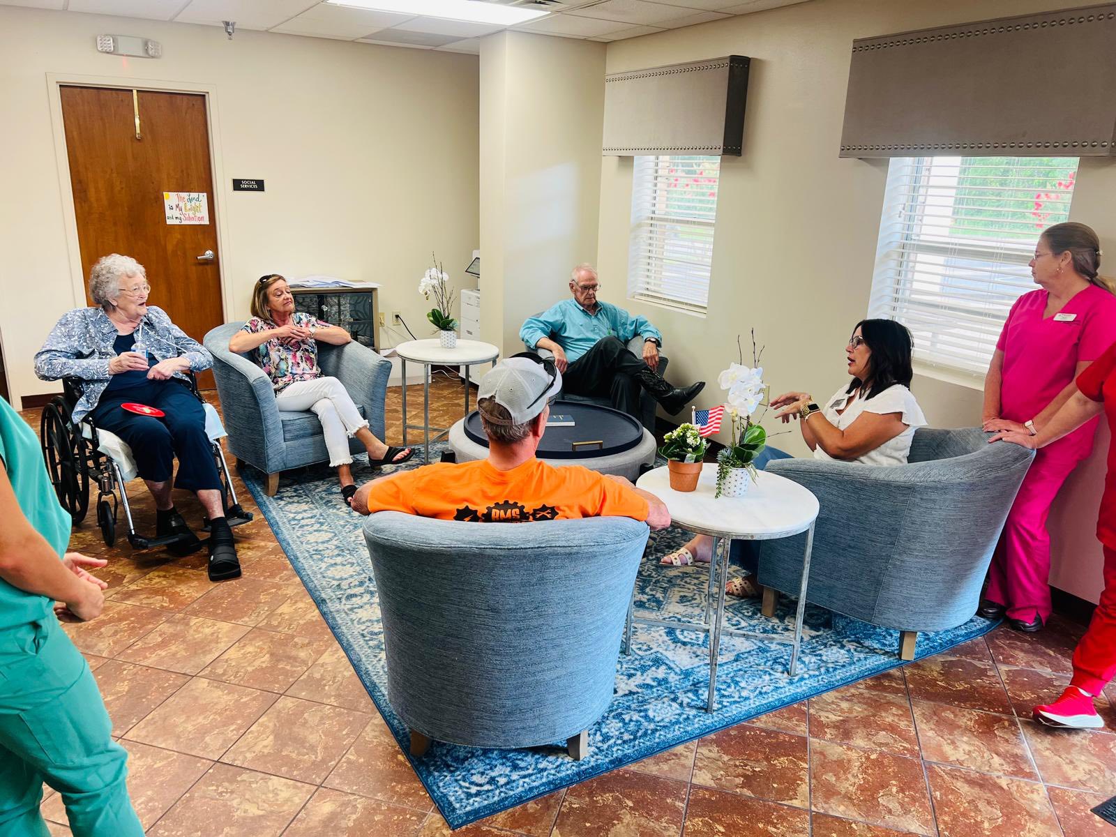 Family members meeting with Princeton Place staff