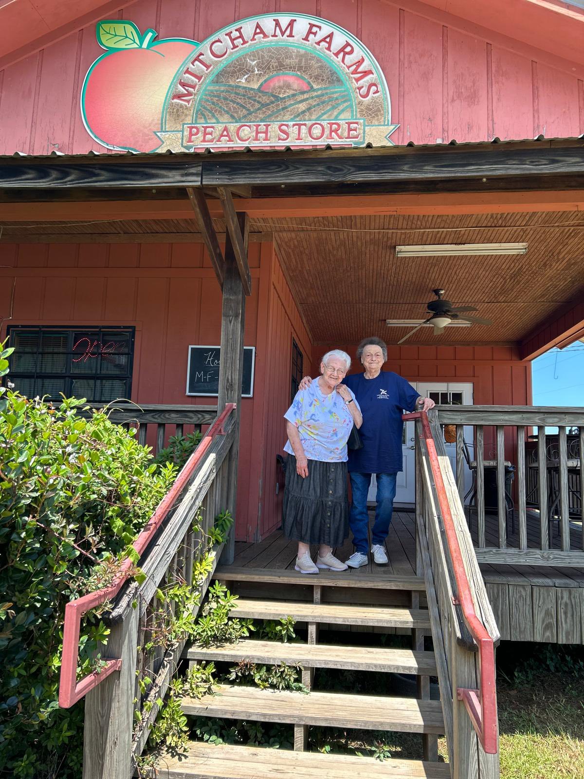 Portrait of two residents on a fun trip to a farm