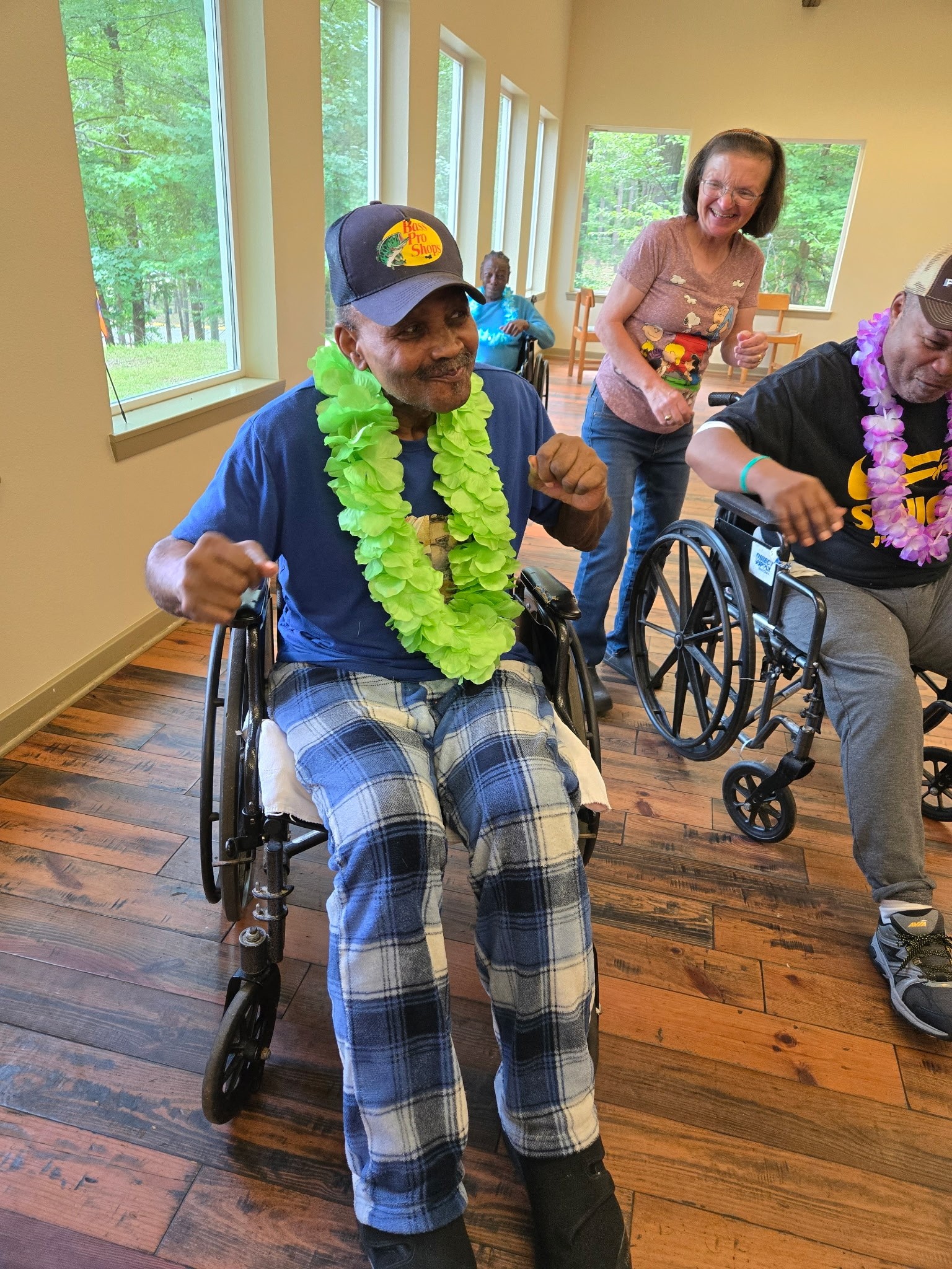 Picture of a happy resident dancing at an outing