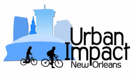 Silhouettes of two bicyclists in front of a blue city skyline with the text Urban Impact New Orleans.