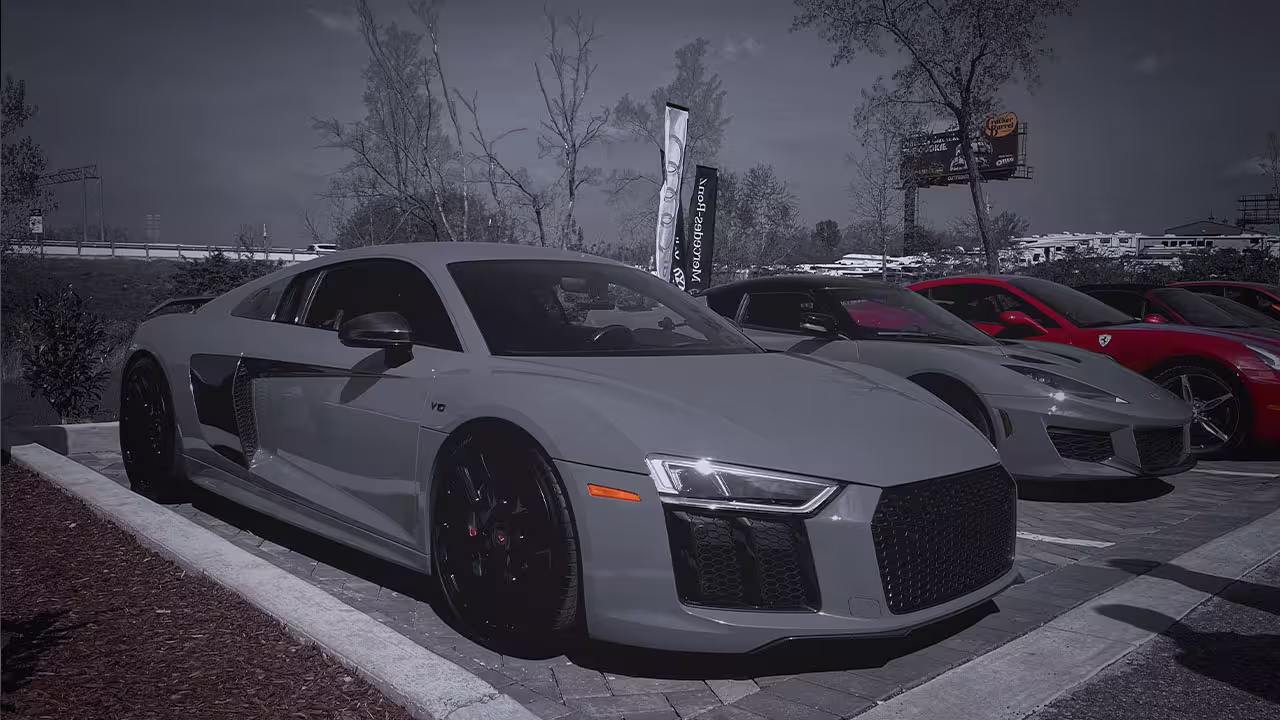 Lineup of Audi R8s parked in front of Cooper’s Garage during a Cars & Coffee event