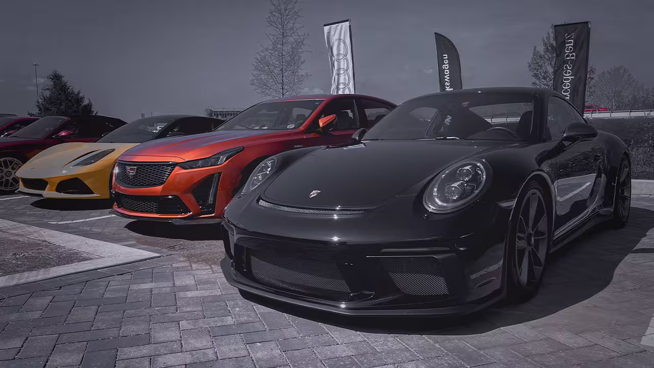 Porsche and other European cars lined up at Cooper’s Garage Cars & Coffee