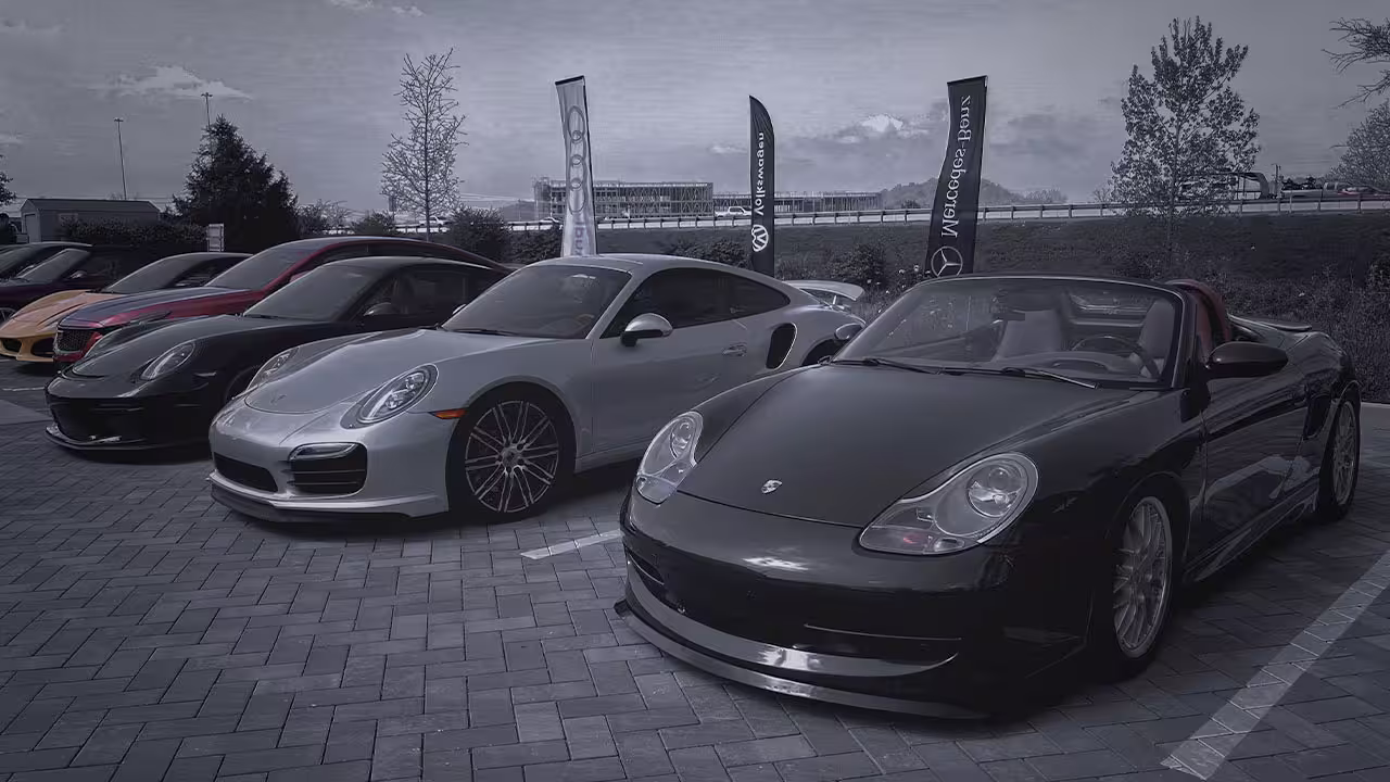 Porsche and other European cars lined up at Cooper’s Garage Cars & Coffee