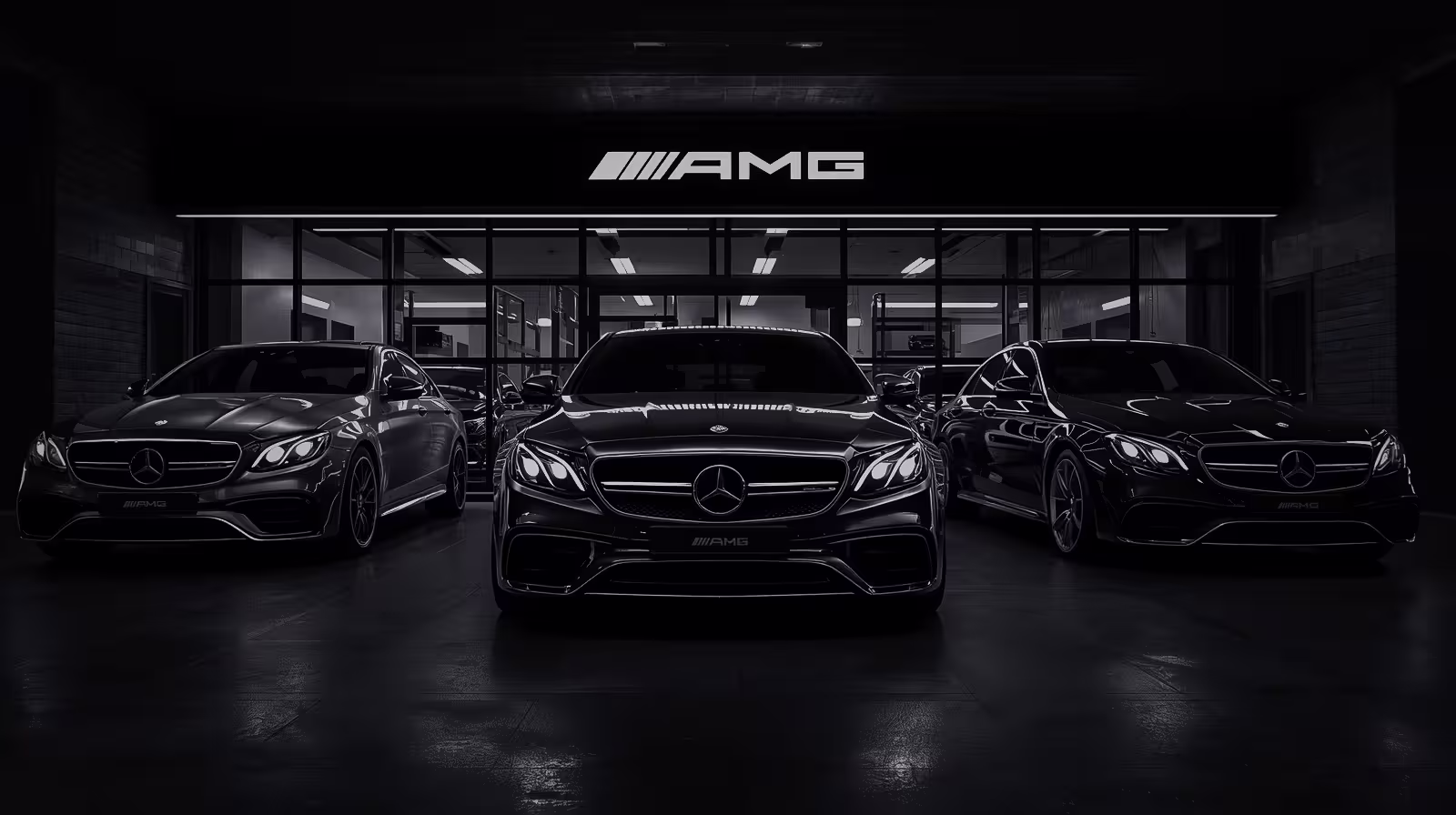 Close-up of Mercedes-AMG twin-turbo engine bay with intake piping and AMG badging