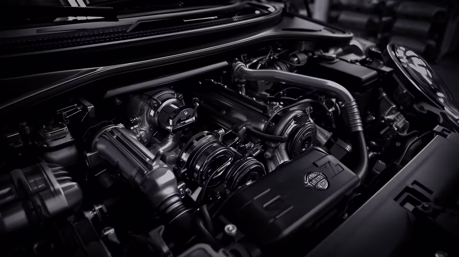 Close-up of MINI Cooper turbocharged engine bay with visible plumbing, tensioners, and high-detail components