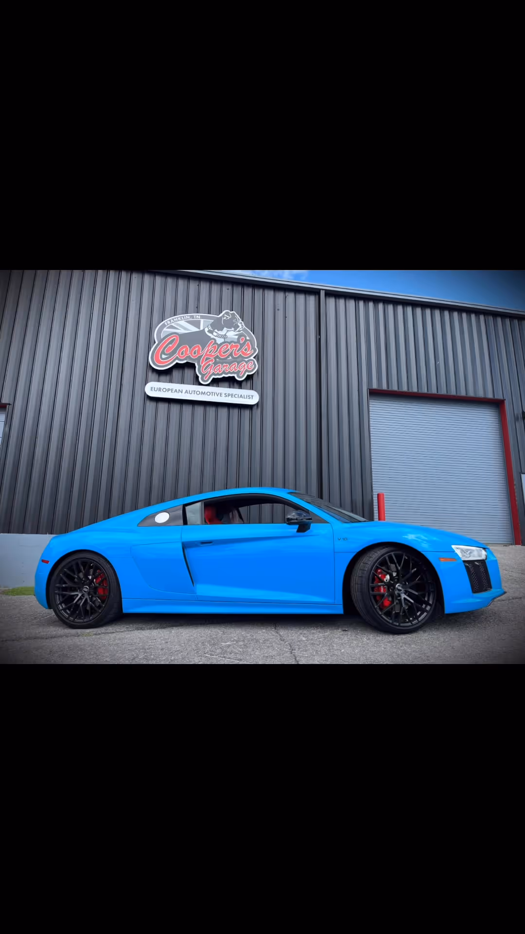 2018 Audi R8 V10 in blue outside Cooper’s Garage.