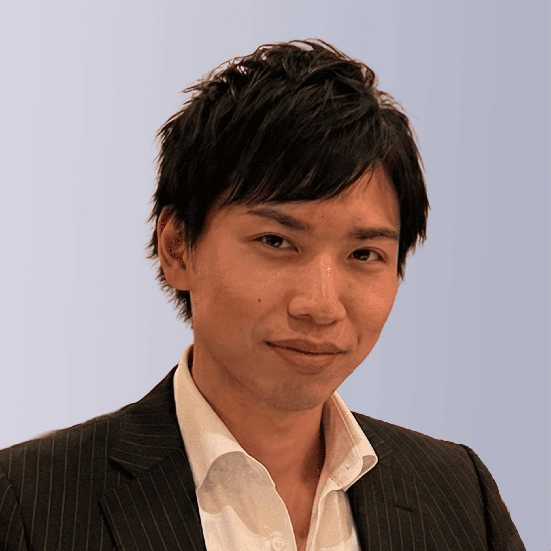 Two professionals shaking hands outdoors, symbolizing partnership and collaboration.